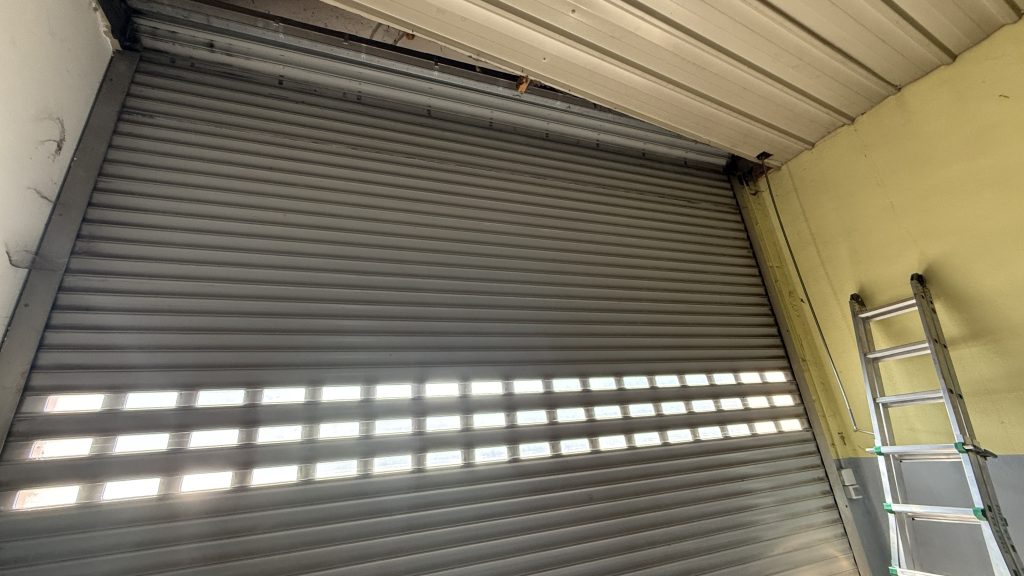 Remplacement moteur Somfy porte de garage enroulable à Sélestat en centre Alsace