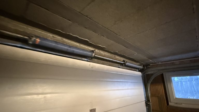 Réparation Porte Sectionnelle Dieffenthal : Remplacement Ressorts de Torsion Rapide